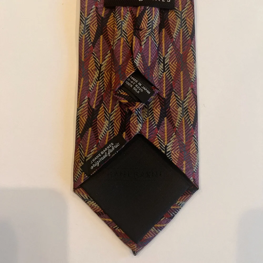 Vintage tie with price tag that has a history Jhane Barnes Abstract design
